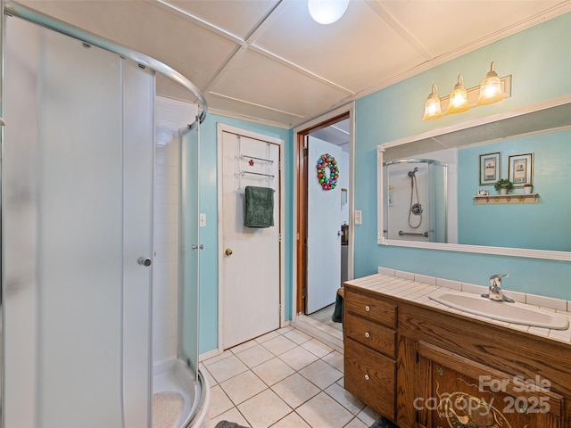 449 Little E Fork Rd, Canton, NC 28716 - bathroom with vanity, a shower stall, tile patterned floors, and ornamental molding
