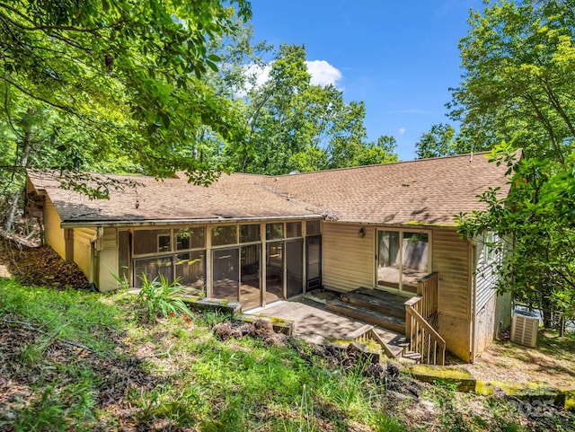 436 Utsonati Ln, Brevard, NC 28712 - back of house with a sunroom and roof with shingles