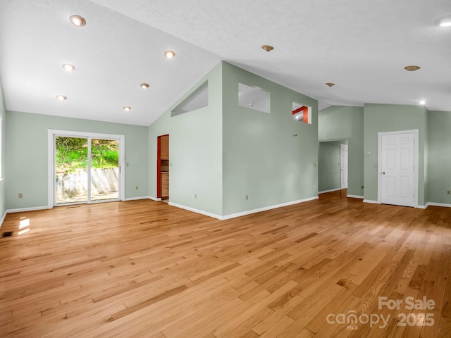 436 Utsonati Ln, Brevard, NC 28712 - spare room with light wood-style floors, high vaulted ceiling, and recessed lighting