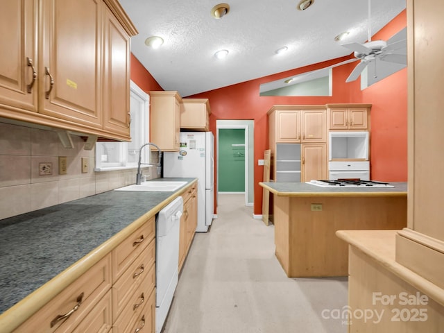 436 Utsonati Ln, Brevard, NC 28712 - kitchen featuring vaulted ceiling, white appliances, decorative backsplash, a ceiling fan, and a textured ceiling