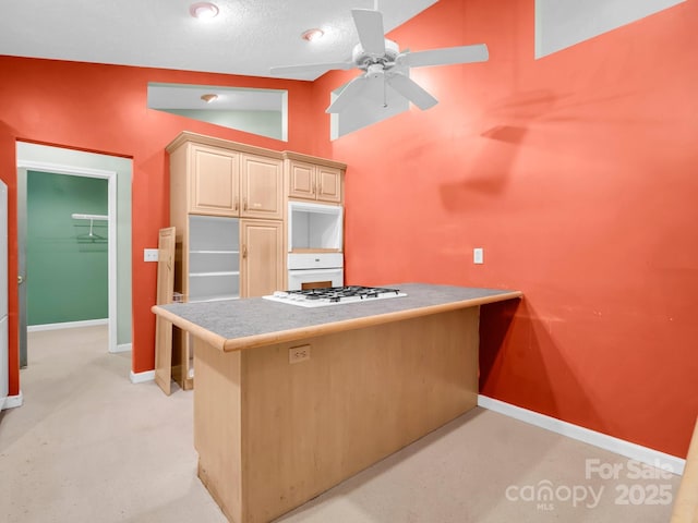 436 Utsonati Ln, Brevard, NC 28712 - kitchen featuring white appliances, a ceiling fan, light countertops, a peninsula, and light carpet