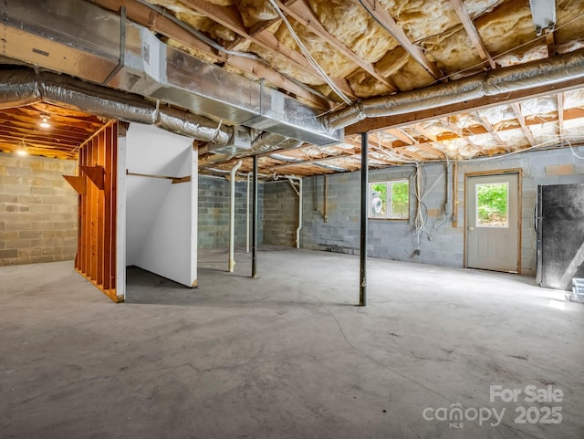 436 Utsonati Ln, Brevard, NC 28712 - basement with freestanding refrigerator
