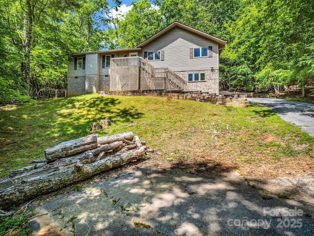 436 Utsonati Ln, Brevard, NC 28712 - rear view of property with stairs, a lawn, and asphalt driveway