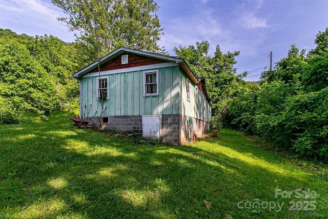 121 Sugar Cove Rd, Weaverville, NC 28787 - view of property exterior with a yard