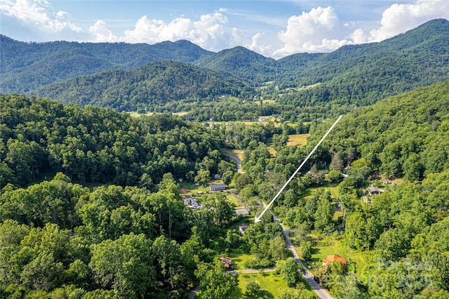 121 Sugar Cove Rd, Weaverville, NC 28787 - aerial view of property's location with a mountain backdrop and property boundaries highlighted