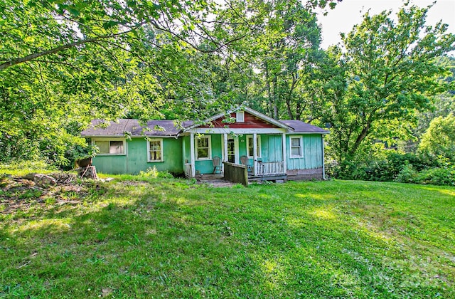 121 Sugar Cove Rd, Weaverville, NC 28787 - view of front of house with a porch and a front lawn