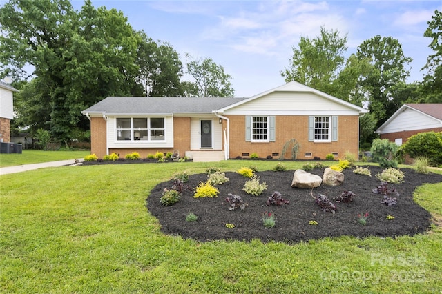 5817 Red Carriage Ln, Charlotte, NC 28212 - ranch-style house with brick siding, a front lawn, and crawl space