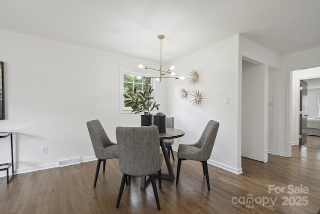 5817 Red Carriage Ln, Charlotte, NC 28212 - dining room with wood finished floors and a chandelier