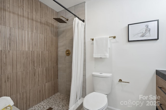5817 Red Carriage Ln, Charlotte, NC 28212 - bathroom featuring vanity and tiled shower