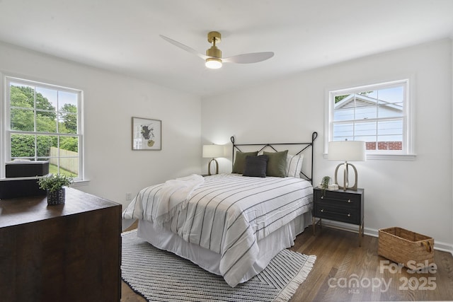 5817 Red Carriage Ln, Charlotte, NC 28212 - bedroom featuring multiple windows, wood finished floors, and a ceiling fan