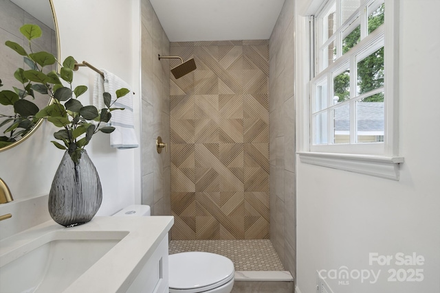 5817 Red Carriage Ln, Charlotte, NC 28212 - bathroom featuring tiled shower and vanity