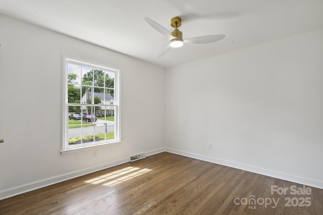 5817 Red Carriage Ln, Charlotte, NC 28212 - unfurnished room with wood finished floors and a ceiling fan