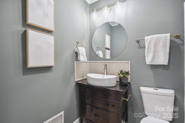 5817 Red Carriage Ln, Charlotte, NC 28212 - half bath featuring vanity and decorative backsplash