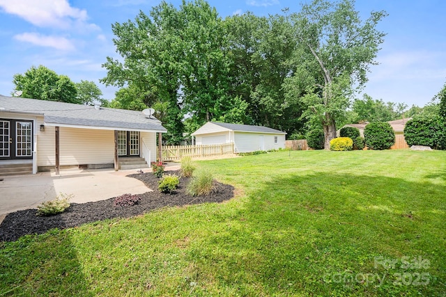 5817 Red Carriage Ln, Charlotte, NC 28212 - view of yard with entry steps, a patio, and an outbuilding