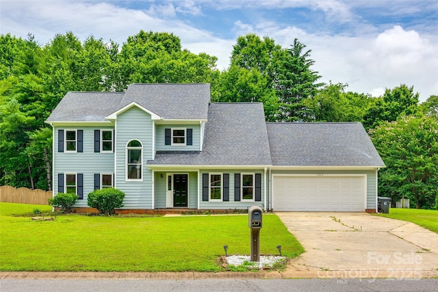 12812 Bradford Hill Ln, Huntersville, NC 28078 - view of front of house with an attached garage, concrete driveway, a front lawn, and a shingled roof