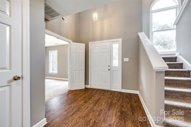 12812 Bradford Hill Ln, Huntersville, NC 28078 - foyer entrance featuring dark wood finished floors and stairs