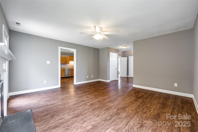 12812 Bradford Hill Ln, Huntersville, NC 28078 - unfurnished living room featuring a fireplace with flush hearth, ceiling fan, and dark wood-type flooring