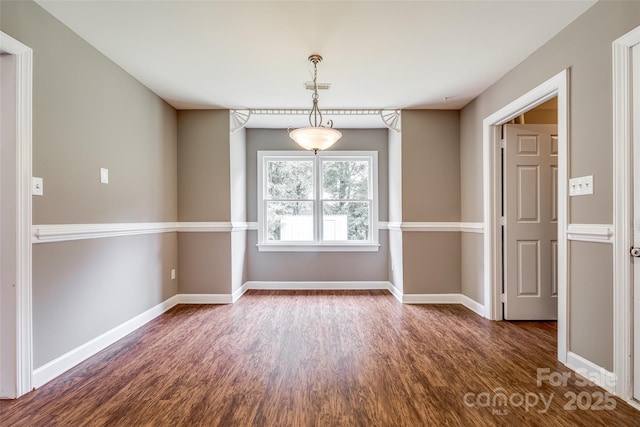 12812 Bradford Hill Ln, Huntersville, NC 28078 - unfurnished dining area featuring dark wood-style flooring and baseboards
