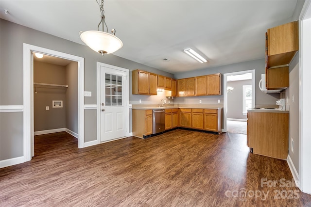 12812 Bradford Hill Ln, Huntersville, NC 28078 - kitchen featuring dishwasher, dark wood-style flooring, light countertops, and brown cabinetry