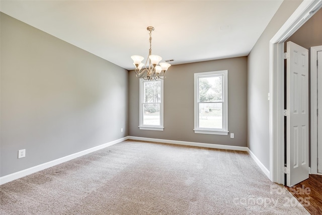 12812 Bradford Hill Ln, Huntersville, NC 28078 - carpeted empty room featuring a chandelier and baseboards