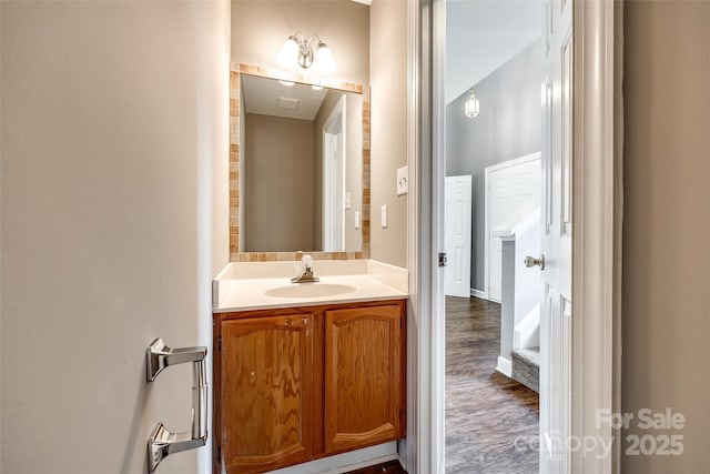 12812 Bradford Hill Ln, Huntersville, NC 28078 - bathroom with vanity and wood finished floors