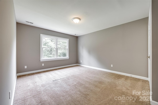 12812 Bradford Hill Ln, Huntersville, NC 28078 - carpeted spare room featuring baseboards