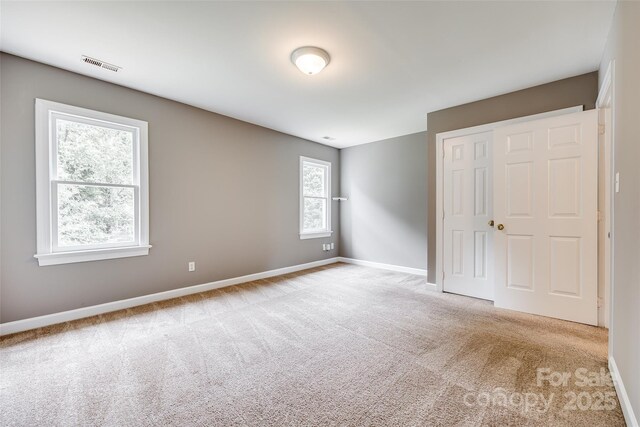 12812 Bradford Hill Ln, Huntersville, NC 28078 - unfurnished bedroom featuring carpet flooring and a closet
