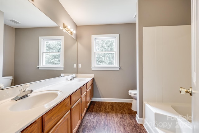 12812 Bradford Hill Ln, Huntersville, NC 28078 - bathroom with double vanity and wood finished floors