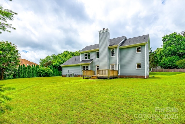 12812 Bradford Hill Ln, Huntersville, NC 28078 - rear view of property with a wooden deck, a lawn, and a chimney