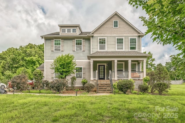 2100 Darian Way, Waxhaw, NC 28173 - view of front of property with covered porch, a front lawn, and a shingled roof