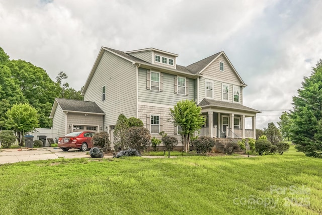 2100 Darian Way, Waxhaw, NC 28173 - view of front of home featuring covered porch, concrete driveway, and a front yard