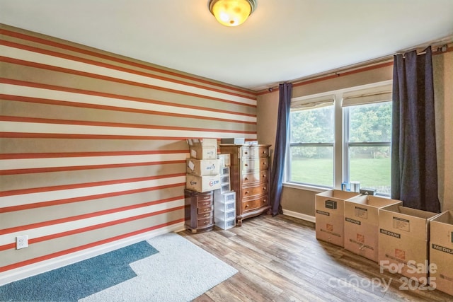 2100 Darian Way, Waxhaw, NC 28173 - unfurnished room with light wood finished floors and wallpapered walls