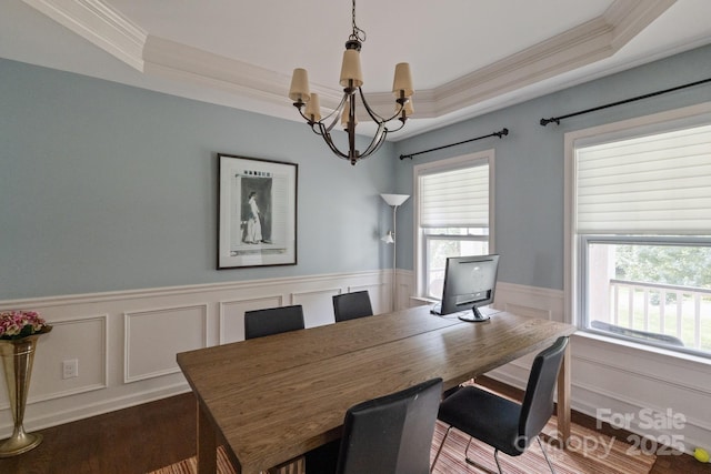 2100 Darian Way, Waxhaw, NC 28173 - dining space featuring ornamental molding, a chandelier, a raised ceiling, dark wood finished floors, and plenty of natural light