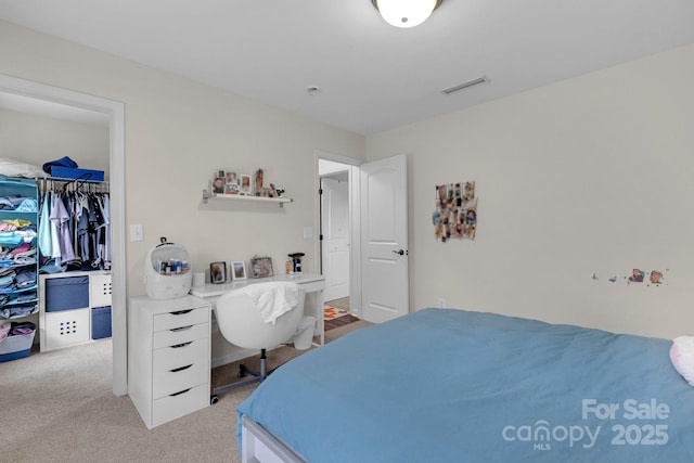 2100 Darian Way, Waxhaw, NC 28173 - carpeted bedroom featuring a walk in closet and a closet