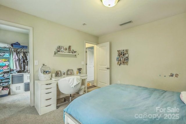 2100 Darian Way, Waxhaw, NC 28173 - bedroom featuring light carpet, a spacious closet, and a closet