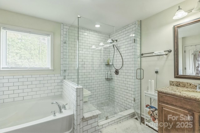 2100 Darian Way, Waxhaw, NC 28173 - bathroom featuring a stall shower, a bath, and vanity