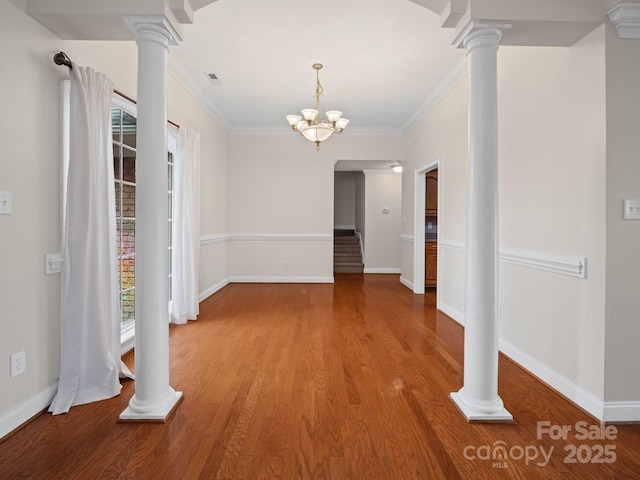 2872 Wheat Field Ct, Lincolnton, NC 28092 - unfurnished room featuring decorative columns, wood finished floors, ornamental molding, and a chandelier