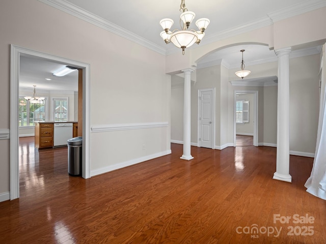 2872 Wheat Field Ct, Lincolnton, NC 28092 - unfurnished dining area featuring crown molding, dark wood finished floors, arched walkways, and decorative columns