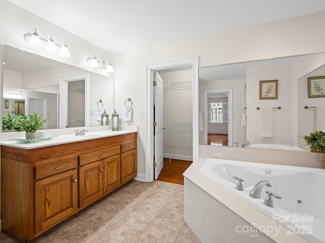 2872 Wheat Field Ct, Lincolnton, NC 28092 - bathroom with vanity, a jetted tub, and tile patterned flooring