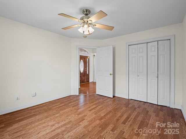 2872 Wheat Field Ct, Lincolnton, NC 28092 - unfurnished bedroom featuring wood finished floors, ceiling fan, and a closet