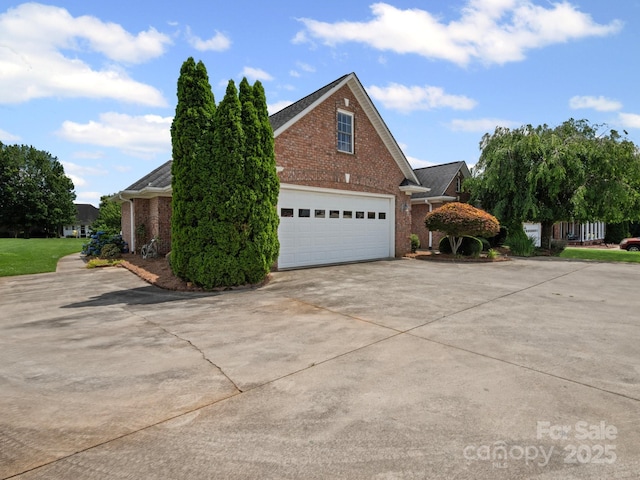 2872 Wheat Field Ct, Lincolnton, NC 28092 - view of property exterior with brick siding, driveway, and an attached garage