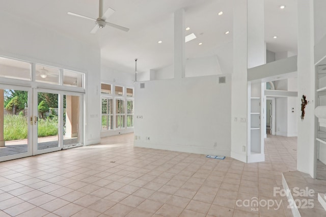 69 Sprouse Town Rd, Weaverville, NC 28787 - spare room featuring high vaulted ceiling, light tile patterned floors, ceiling fan, and french doors