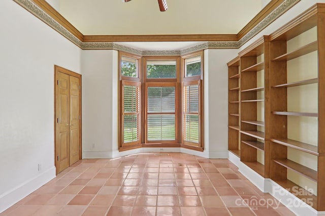 69 Sprouse Town Rd, Weaverville, NC 28787 - spare room with crown molding, light tile patterned floors, and a ceiling fan