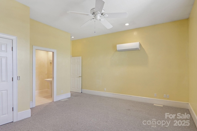 69 Sprouse Town Rd, Weaverville, NC 28787 - unfurnished bedroom featuring a wall mounted air conditioner, carpet floors, ensuite bath, recessed lighting, and a ceiling fan