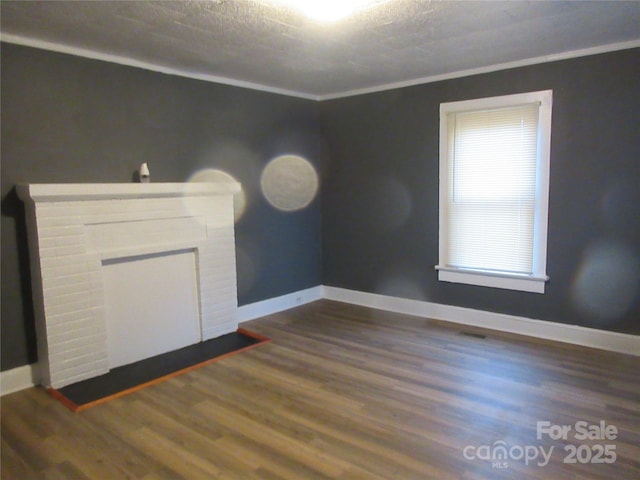 1110 20th St NE, Hickory, NC 28601 - empty room with baseboards and dark wood-type flooring
