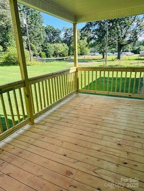 3577 Ken Mcentire Rd, Lawndale, NC 28090 - wooden terrace featuring a lawn and view of scattered trees