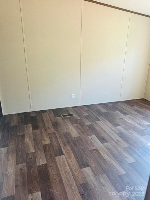 3577 Ken Mcentire Rd, Lawndale, NC 28090 - unfurnished bedroom with dark wood finished floors and a closet