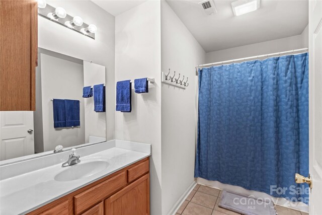 428 Mountview Dr, Mocksville, NC 27028 - bathroom featuring tile patterned flooring and vanity