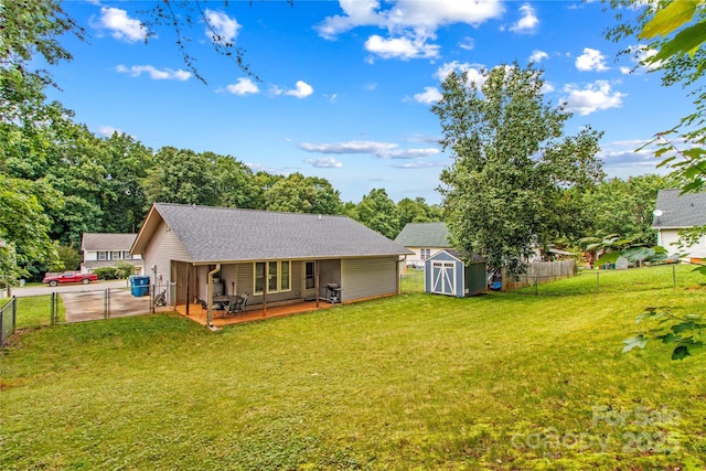 428 Mountview Dr, Mocksville, NC 27028 - rear view of property with a fenced backyard, a patio area, a storage shed, and a gate