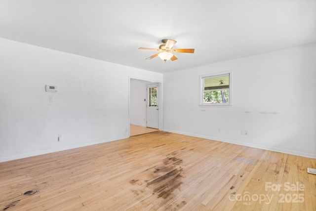 917 Sunset Ave SW, Valdese, NC 28690 - unfurnished room featuring ceiling fan and light wood-style flooring